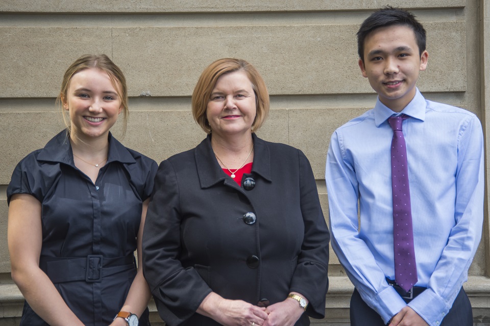 Prize-winners Josephine Auer and Richard Khuu with Susan Buckley, Managing Director of Global Liquid Strategies at QIC