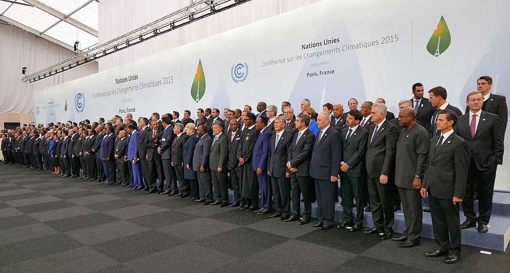 2015 Paris Conference on Climate Change delegates standing together