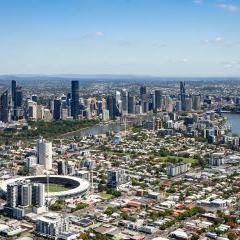 An aerial shot of Brisbane City with Gabba Stadium in shot