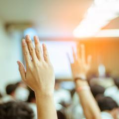 hand raised in classroom