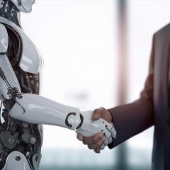 Man shaking hand with a humanlike robot 