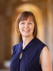 Headshot of Fiona Stroud standing in the Great Court