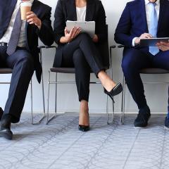 Professionals sitting in chairs