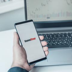 The word 'Gamestop' on a mobile phone screen