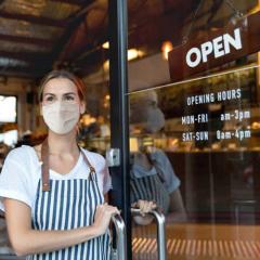 Business owner wearing a face mask